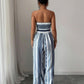 🎁Nyhet – 50 % rabatt💥 Geometrisk jumpsuit med halterneck och slits i sidan – Unikt mönster, elegant passform, mångsidig stil ✨